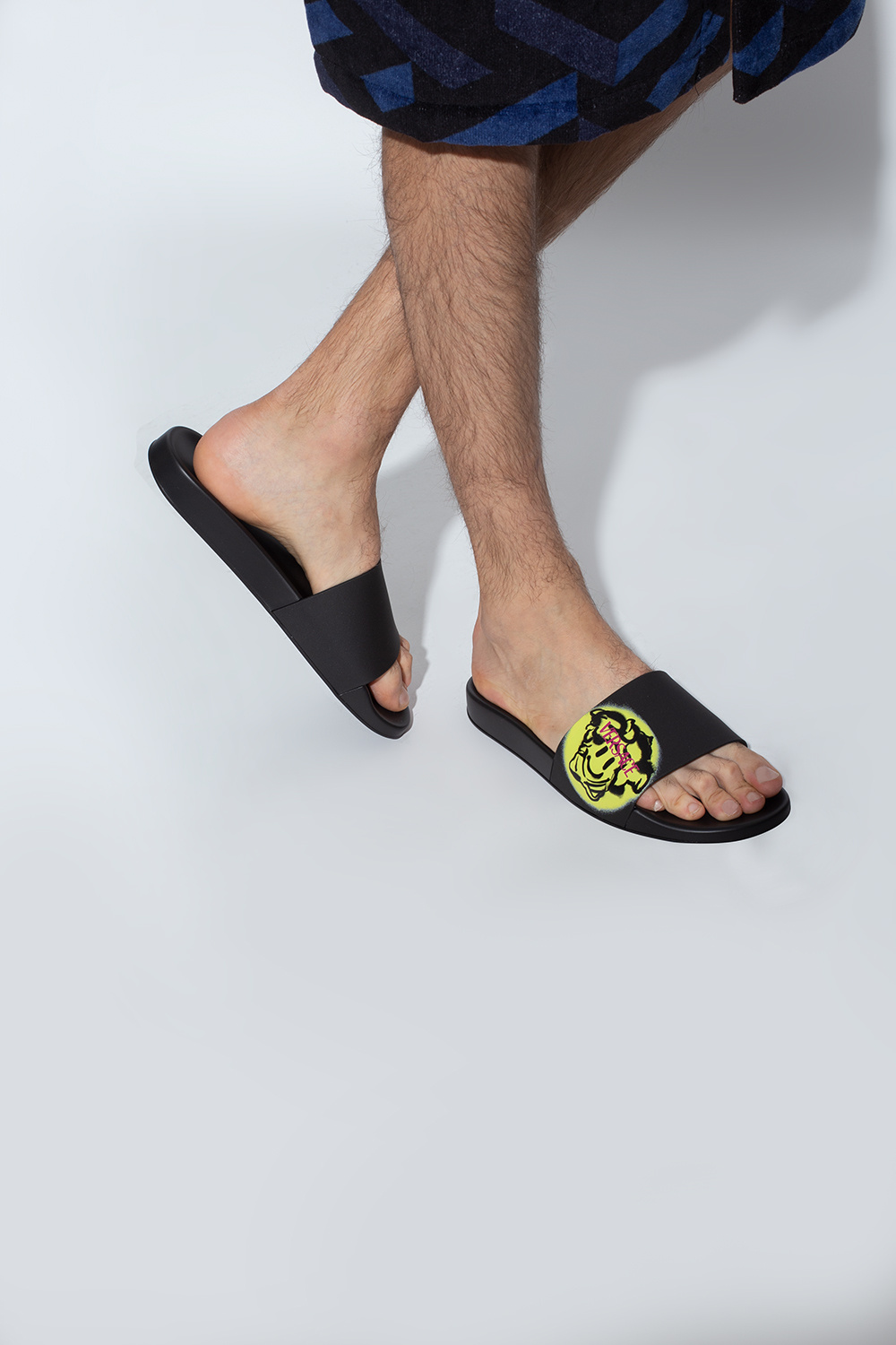 Versace slides on discount feet